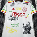 Camisa Ajax 25/26 - Bob Marley 40th Edition